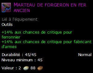 Marteau de forgeron en fer ancien