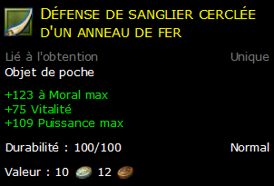 Défense de sanglier cerclée d'un anneau de fer